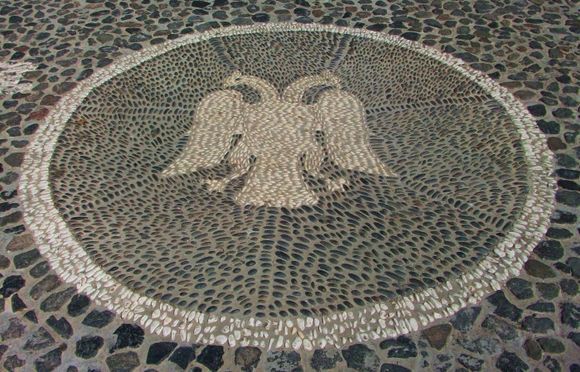 Beautiful mosaic, in front of the church in Fira, Santorini.