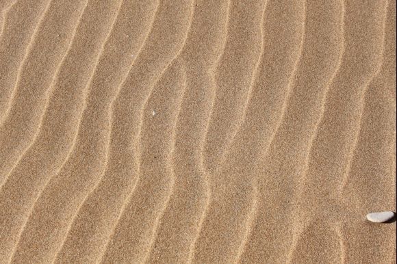 Golden sand waves at Issos beach