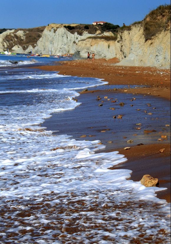 Xi beach, red sand and grey clay