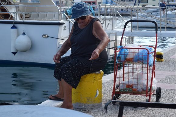 We sat watching this old lady fishing for ages. She never seemed to catch anything bigger than this little fish, but she was quite chilled out.