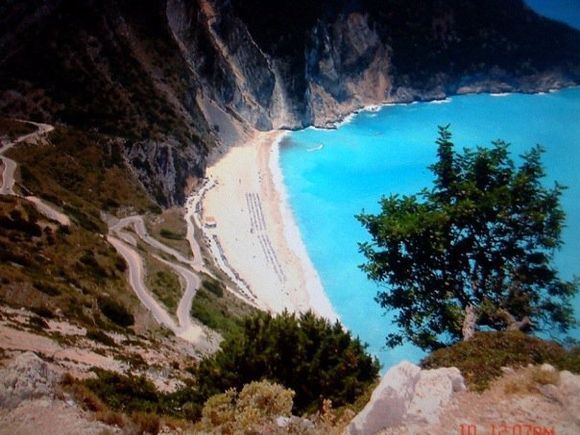 The lovely myrtos beach before the new road was built 💖