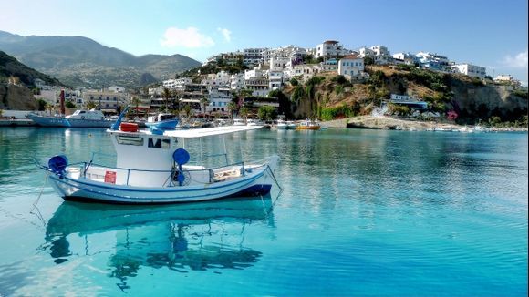 a fishingboat in the harbour of agia gallini