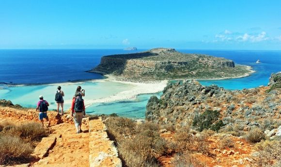 people are admiring the view over balos lagoon