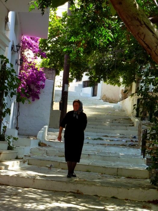 Woman walking down a staired alley