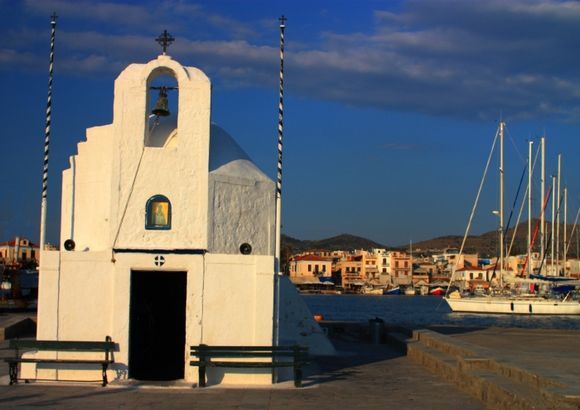 Aegina town harbour church and boats