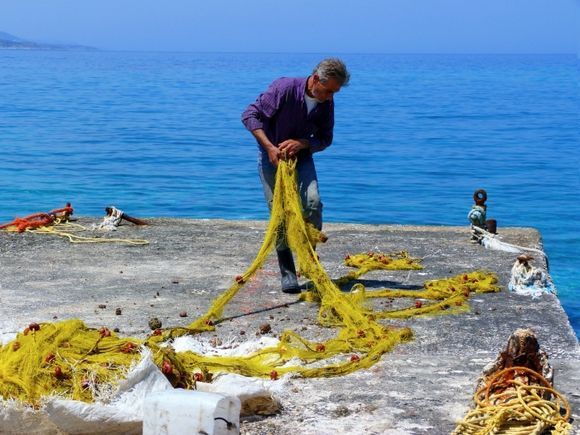 Fisherman, sea and nets