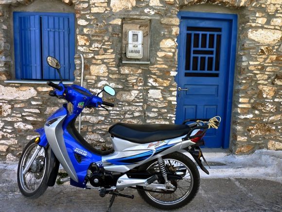Blue facade and motorbike