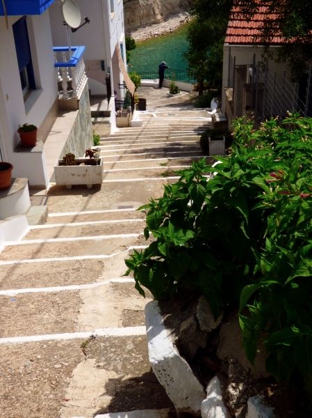 Stepped alley down to Votsi bay