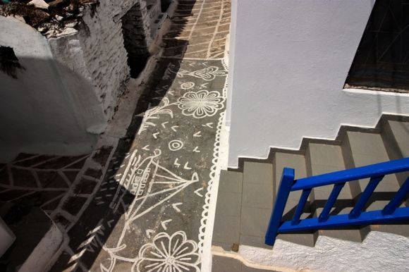 Overview of a painted alley and a flight of stairs
