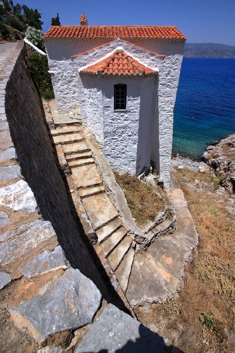 Church with red tiled roof and steep staicase, Mandraki