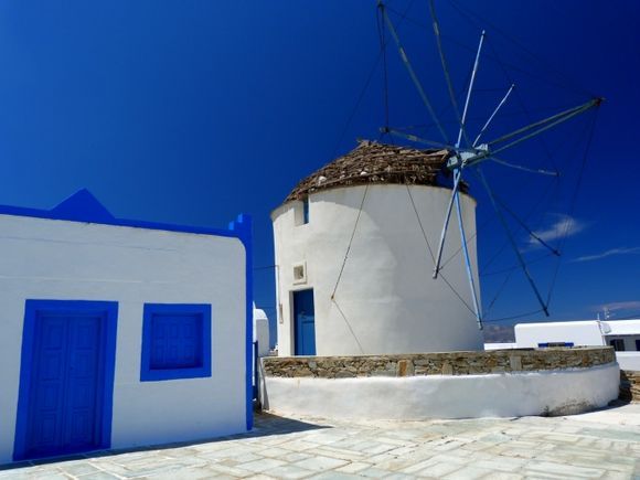 Windmill and blue house