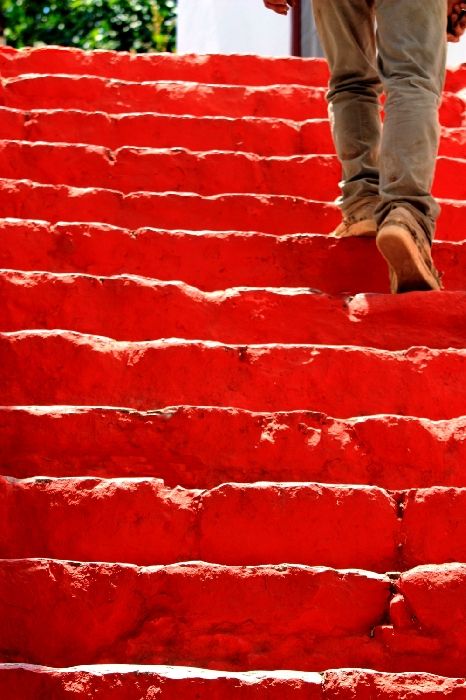 Walk up Kaminia\'s red steps