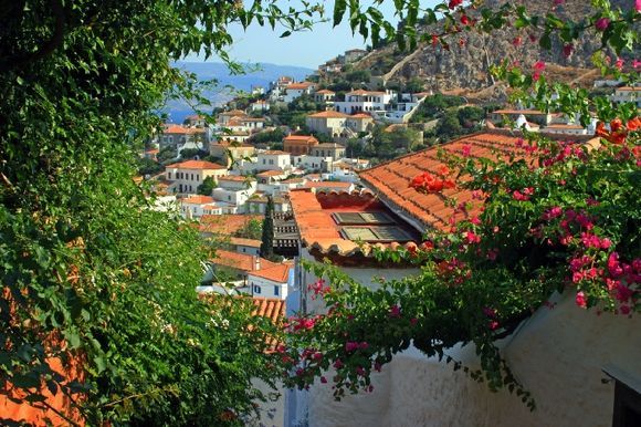 Scenery with red tiled roofs and bougainvillea
