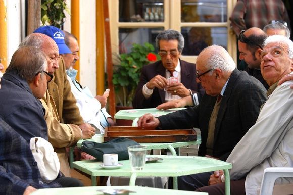 People playing tavli in a kafeneio, Rodos town