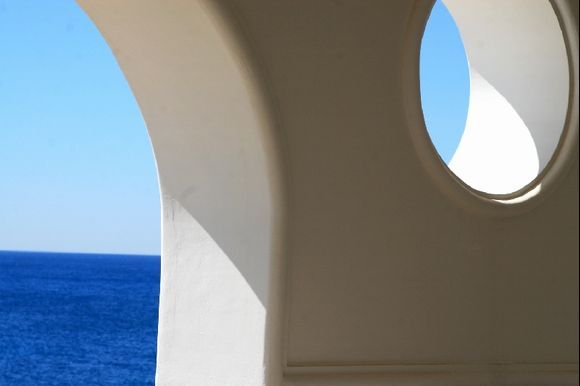 Sea view through arches in Kallithea