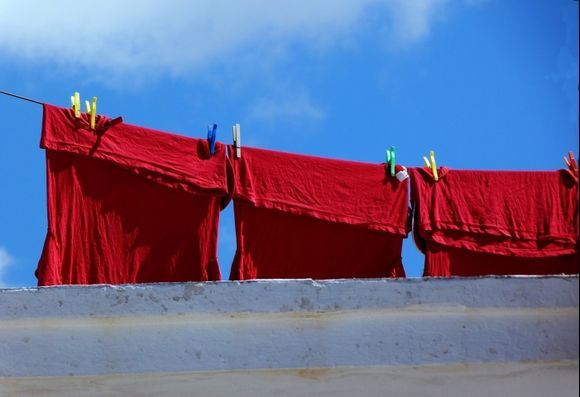 Red laundry and blue sky