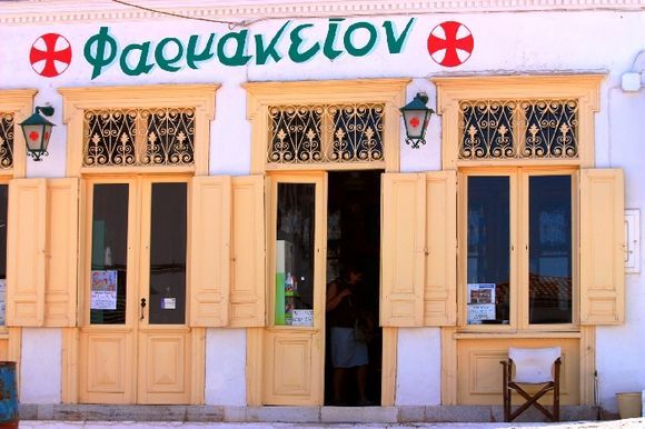 Neoclassical building housing the older pharmacy in Hydra town