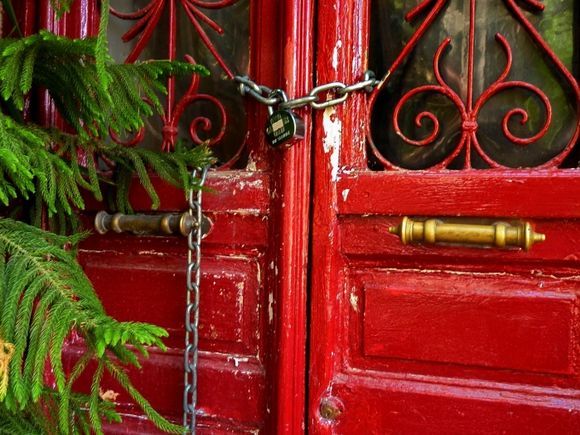 Close up view of red wooden door