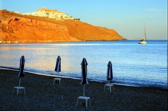 Before sunset, an empty beach and a view of Chora