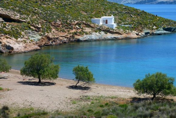 Agia Thalassa beach with Agios Nikolaos church, Panormos Bay
