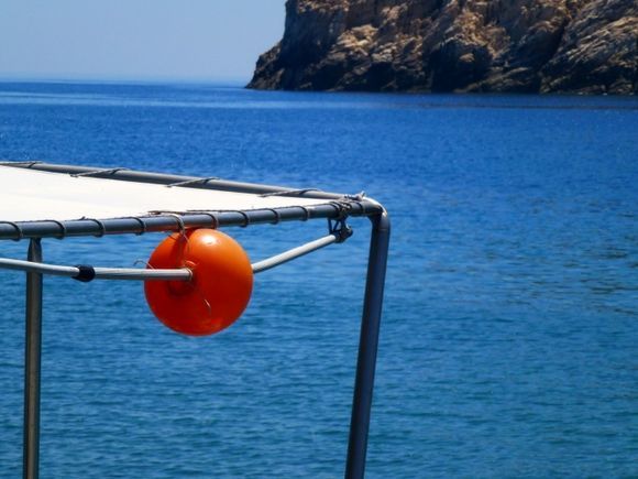 Buoy and sea in Apollonas harbour