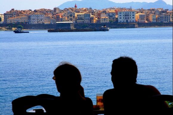 Couple on Vido island watching Corfu old town