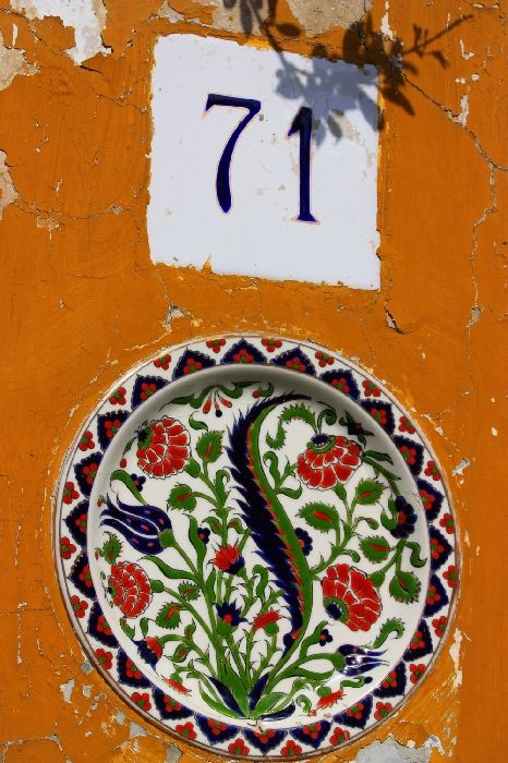 Architectural detail with colorful ceramic and wall, Koskinou