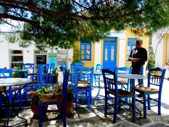 Lefkes square with traditional colorful kafeneio