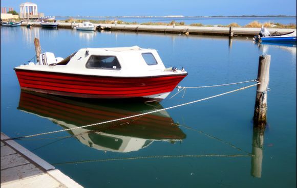 Lagoon with red boat, Lefkas town