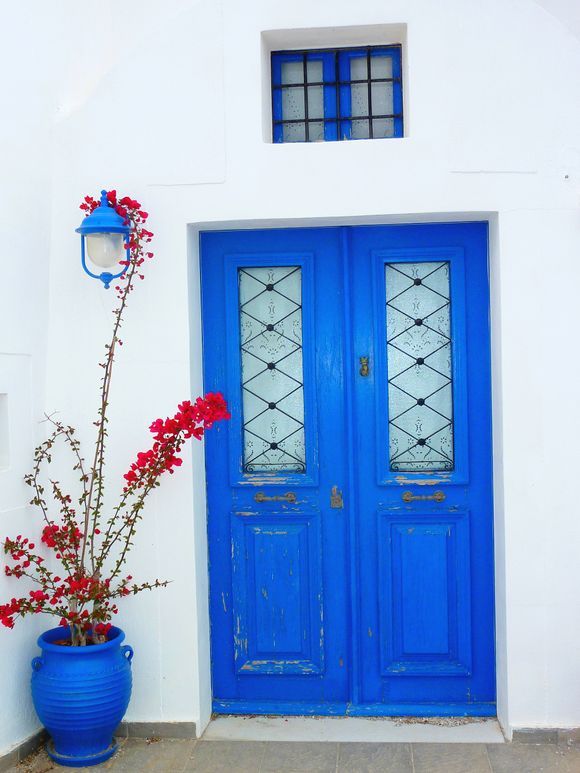 Blue entrance with bougainvillea, Oia