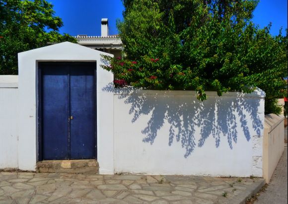 Traditional house with blue gate