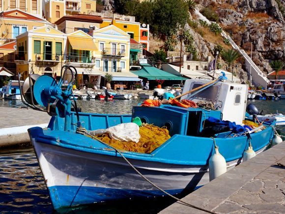 Blue fishing boat in Gialos, Simi island, Dodecanese