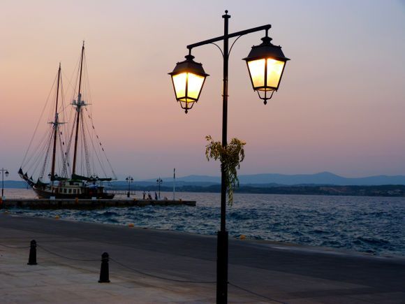 Sunset, sailboat and lamp post, Spetses