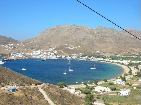 the bay of livadi on the island of Serifos. Each week-end people from Athens take the ferry or the catamaran to come here to the beach and to eat in the beachrestaurants of livadi.