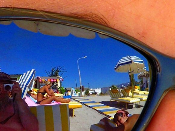 Reflextions of a sunny greek beach