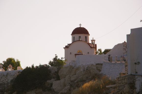 Red roof church at sunrise