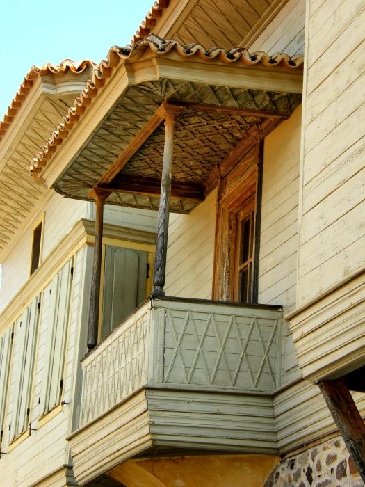 A very old detaild wooden balcony a side shot