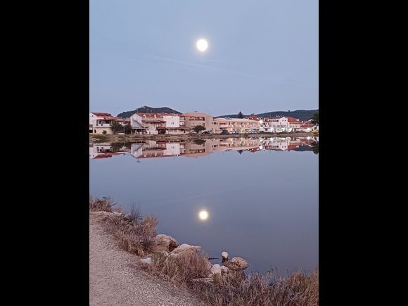 Full moon on salt lake.