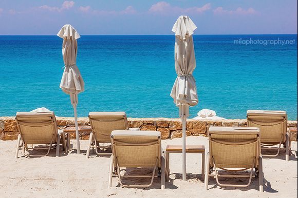 Lounge chairs on the beach in Sani
