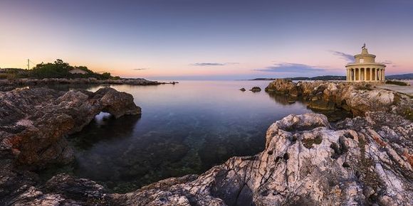 panorama with lighthouse of saint theodoroi near argostoli