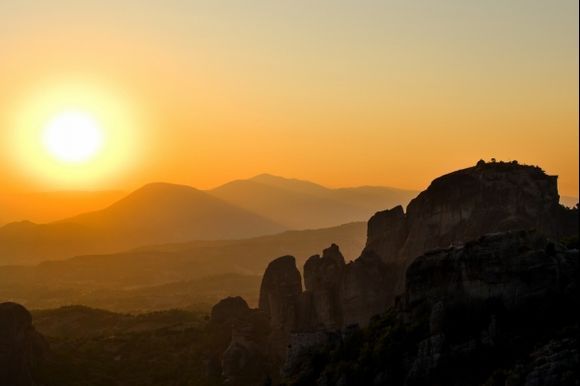 Sunset over the rocks of Meteora and the Plain of Thessaly.