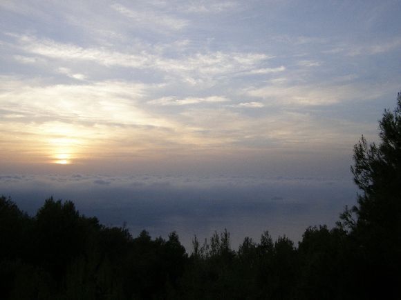 sunset through fog seen from Athani