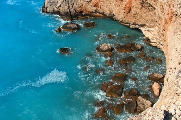 Rocks in a bay near Porto Katsiki when the sea was wildly shaken and the water became all mixed up with white sand (Lefkada)