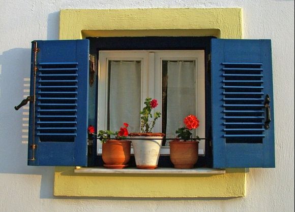 A Greek window. I love the way the greek people showcase their many humble homes