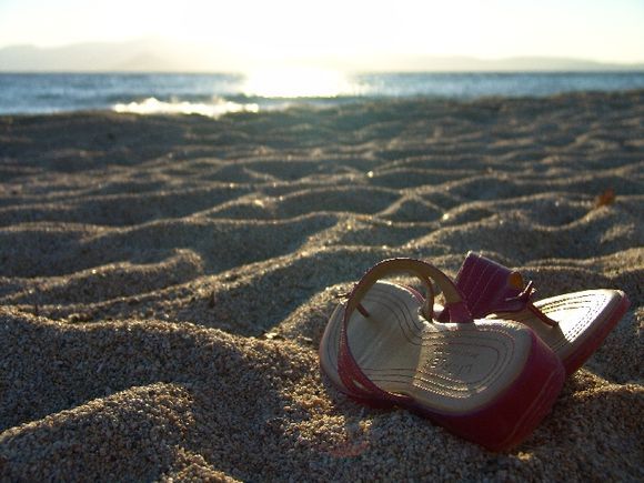 Agapi mou\'s sandals on Plaka Beach, September, 2007.