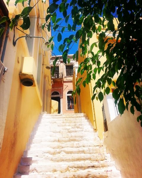 Steps in yellow street on Symi island