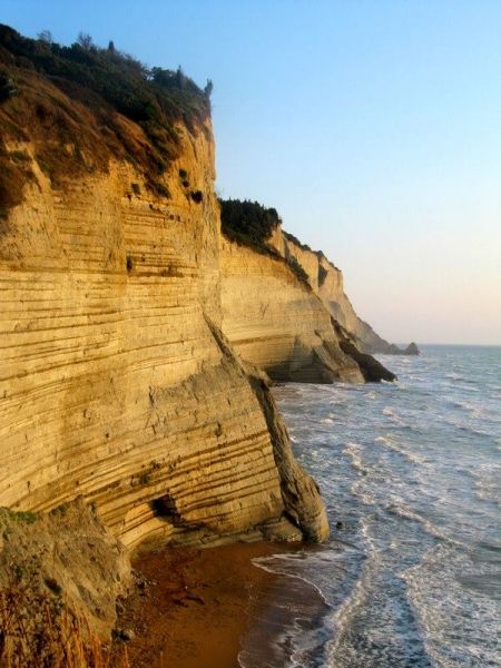 on the Edge of Earth....windy side of Corfu in village Peroulades.  Logas Sunset Beach