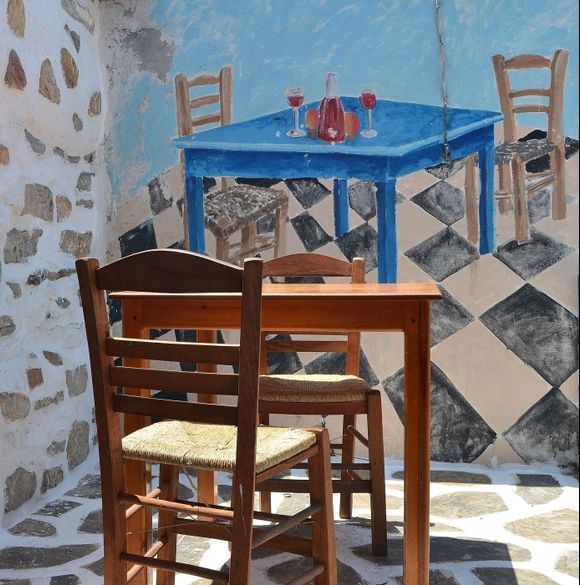 What chair is real....at Kolofana village(Delfini Taverna)