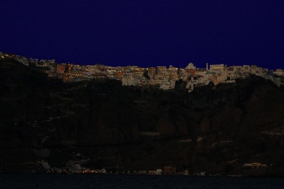 twinkling lights of Fira by night