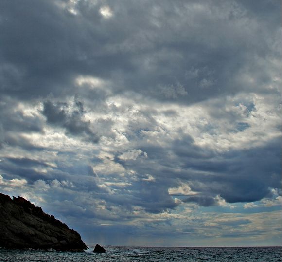clouds, sea and rocks